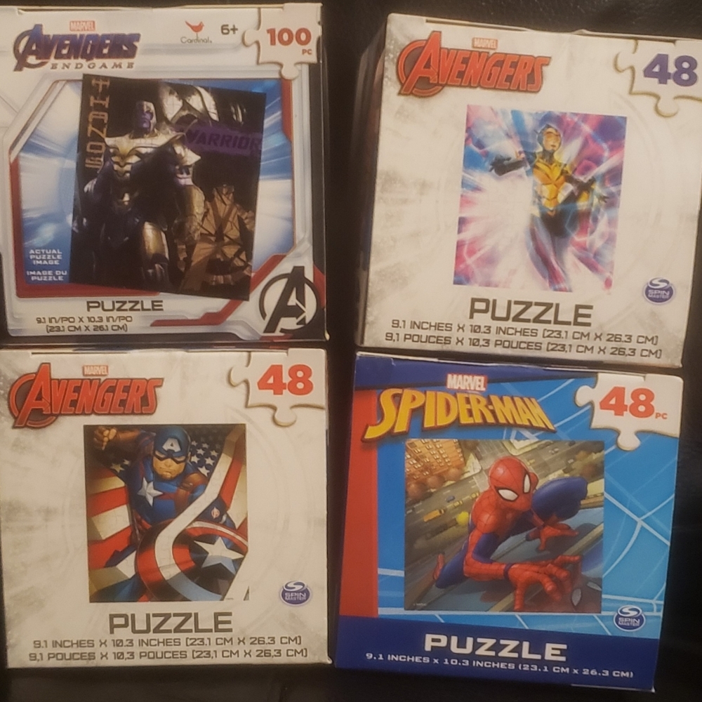 Lot of 4 Marvel Puzzles Avengers Wasp, Thanos, Captain America, & Spiderman